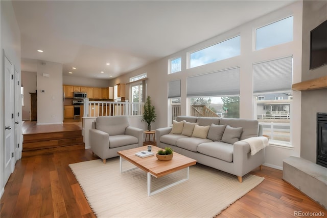 7506 Chipmunk Pl, Littleton, CO 80125 - living area with light wood-style floors, recessed lighting, and baseboards