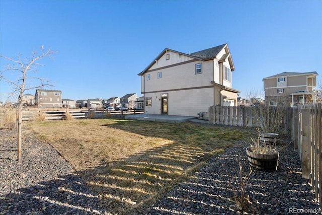 view of yard with a fenced backyard and a patio