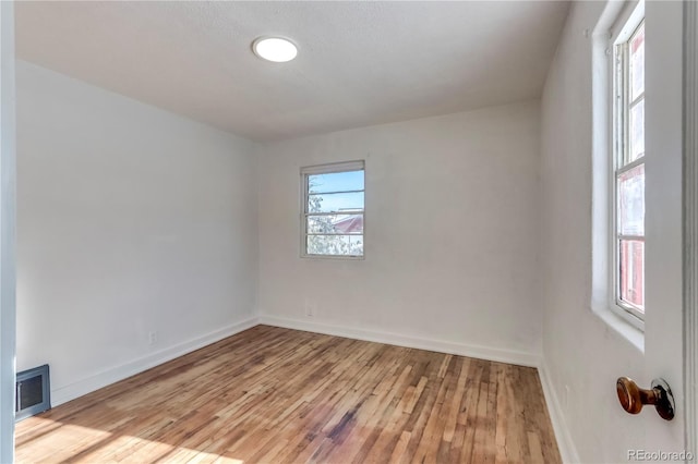 empty room featuring light hardwood / wood-style floors