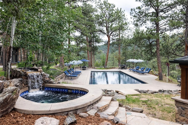 pool featuring a patio area