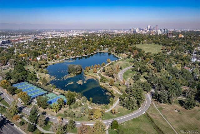 birds eye view of property with a water view