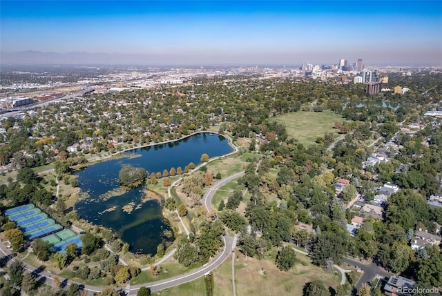 birds eye view of property with a view of city and a water view