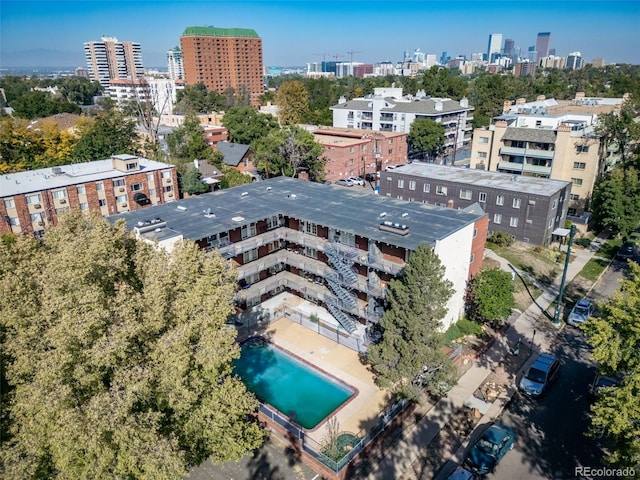 birds eye view of property featuring a city view