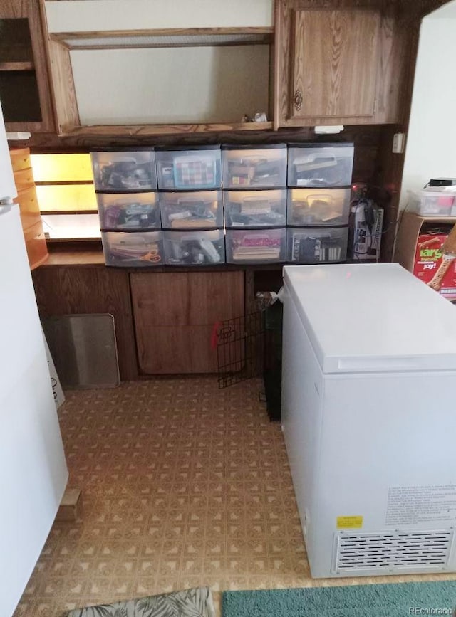 10795 County Road 197 A Unit 105, Nathrop, CO 81236 - clothes washing area with tile patterned floors