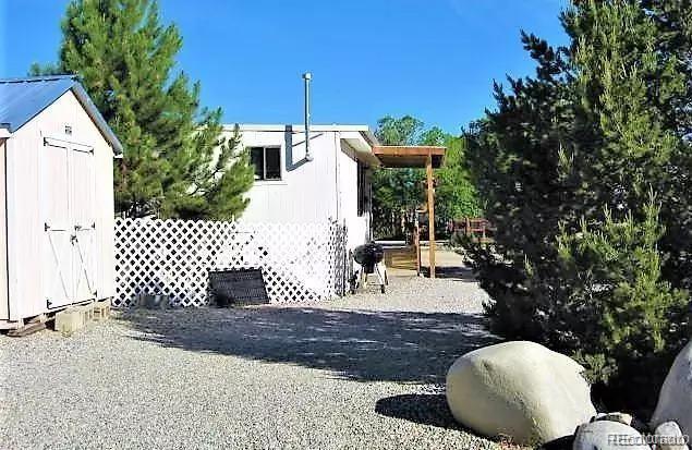 10795 County Road 197 A Unit 105, Nathrop, CO 81236 - view of side of property featuring a storage shed