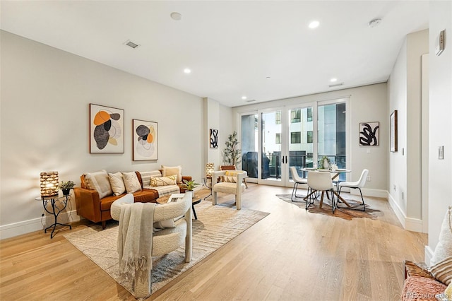 250 Columbine St Unit 310, Denver, CO 80206 - living area with light wood-style floors, recessed lighting, and baseboards