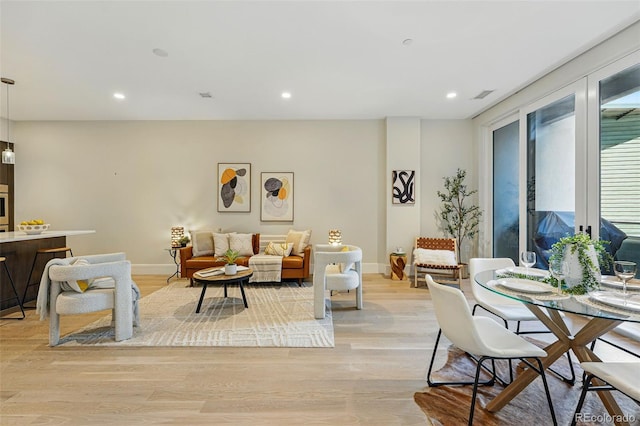 250 Columbine St Unit 310, Denver, CO 80206 - living area featuring light wood-style floors, recessed lighting, and baseboards