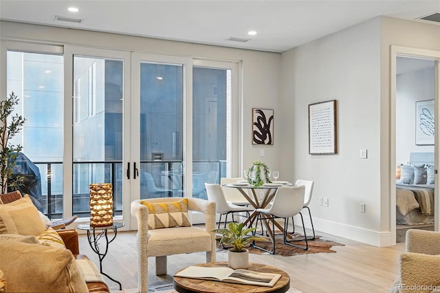 250 Columbine St Unit 310, Denver, CO 80206 - living room featuring wood finished floors, baseboards, and recessed lighting