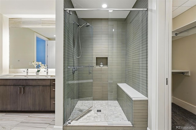 250 Columbine St Unit 310, Denver, CO 80206 - bathroom featuring vanity, a shower stall, and recessed lighting