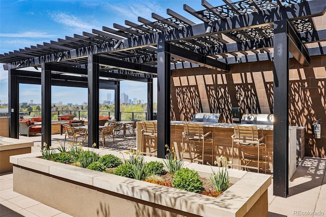 250 Columbine St Unit 310, Denver, CO 80206 - view of patio with an outdoor kitchen, a pergola, and exterior bar