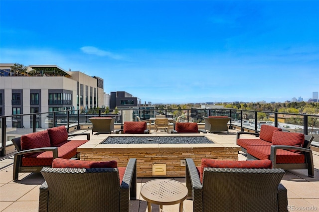250 Columbine St Unit 310, Denver, CO 80206 - view of patio with an outdoor living space with a fire pit