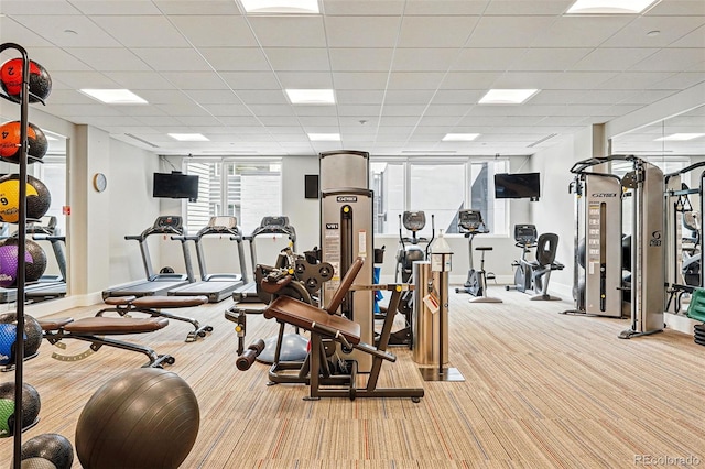 250 Columbine St Unit 310, Denver, CO 80206 - exercise room featuring light carpet, baseboards, and a drop ceiling