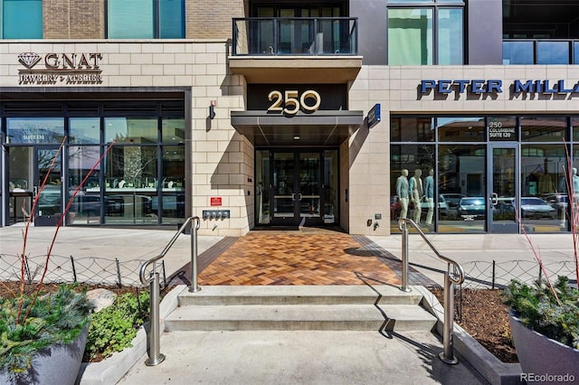 250 Columbine St Unit 310, Denver, CO 80206 - property entrance with french doors and brick siding
