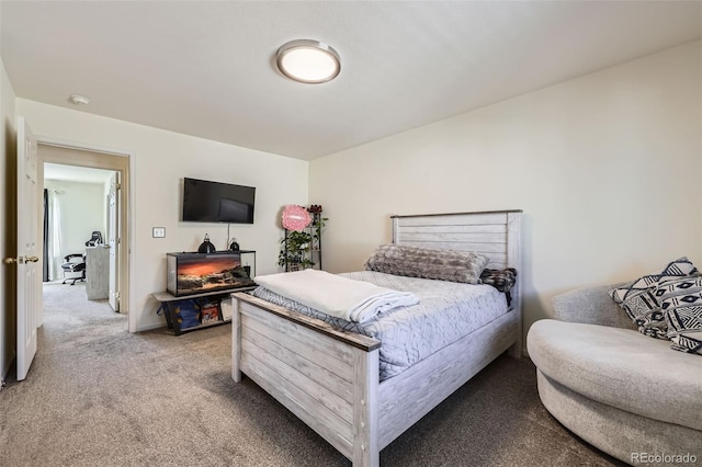 bedroom with light colored carpet