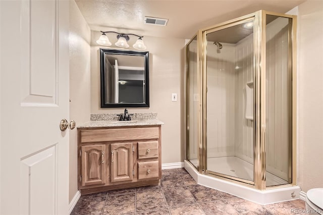 2141 Weatherstone Cir, Highlands Ranch, CO 80126 - bathroom with a stall shower, vanity, and baseboards