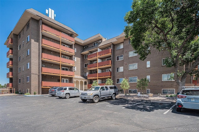 3047 W 47th Ave Unit 109, Denver, CO 80211 - view of apartment building / complex featuring uncovered parking