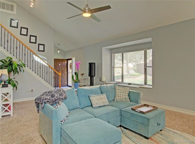 4506 Winewood Village Dr, Colorado Springs, CO 80917 - carpeted living area featuring stairway, ceiling fan, baseboards, and high vaulted ceiling