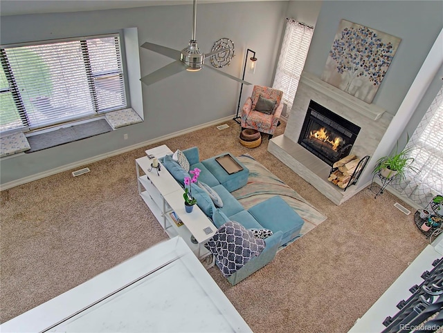 4506 Winewood Village Dr, Colorado Springs, CO 80917 - carpeted living area with a premium fireplace and baseboards