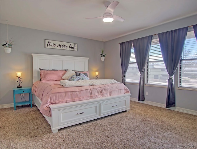 4506 Winewood Village Dr, Colorado Springs, CO 80917 - bedroom featuring light carpet, a ceiling fan, and baseboards