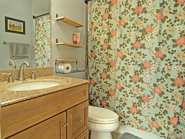 4506 Winewood Village Dr, Colorado Springs, CO 80917 - full bathroom featuring toilet, a textured wall, vanity, and a shower with shower curtain