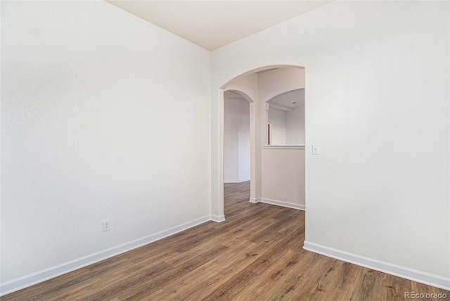 empty room featuring hardwood / wood-style floors