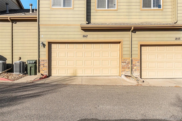 garage with central AC unit