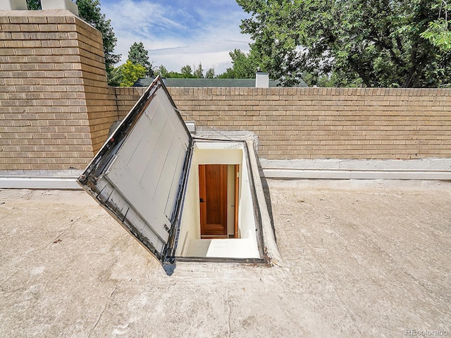 view of entry to storm shelter