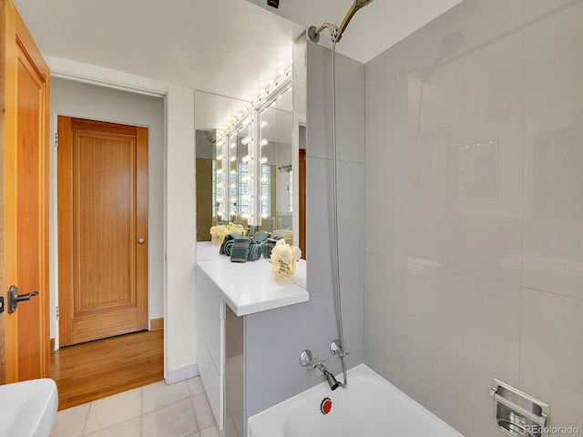 full bathroom with tile patterned flooring and tub / shower combination