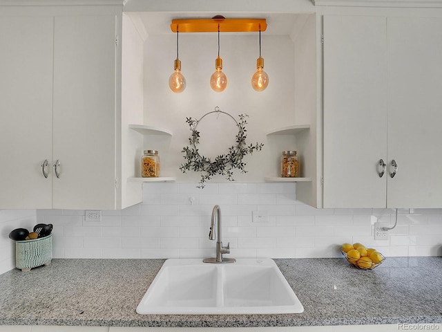 kitchen featuring white cabinetry and open shelves