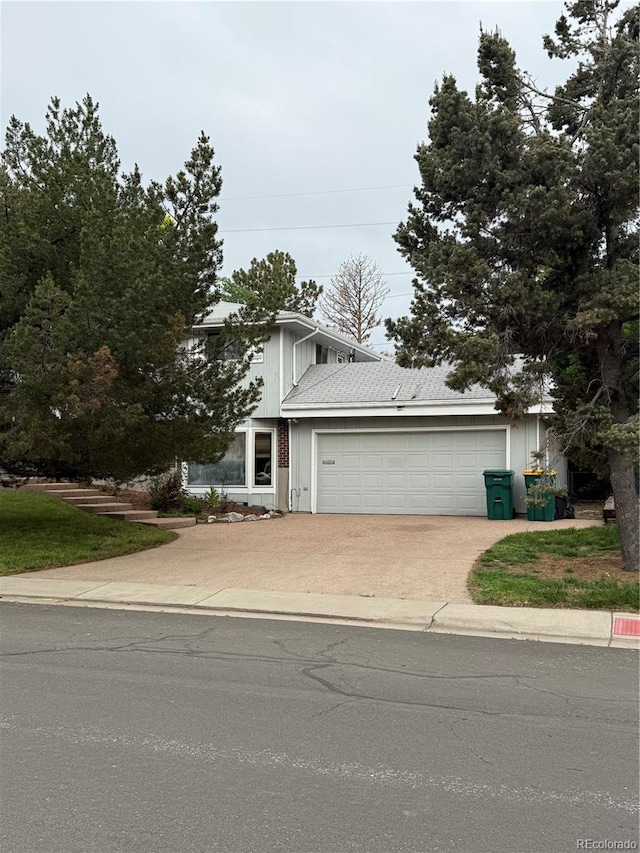 3566 E Fair Pl, Centennial, CO 80121 - view of front of property featuring an attached garage and concrete driveway