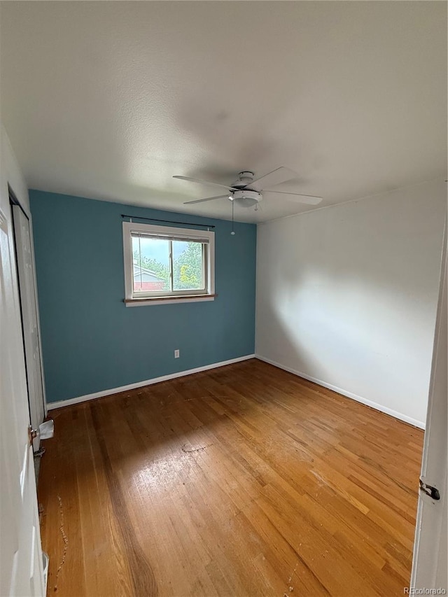 3566 E Fair Pl, Centennial, CO 80121 - empty room featuring wood finished floors and ceiling fan