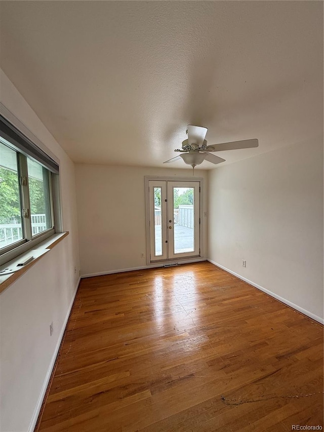 3566 E Fair Pl, Centennial, CO 80121 - empty room featuring wood finished floors and a ceiling fan