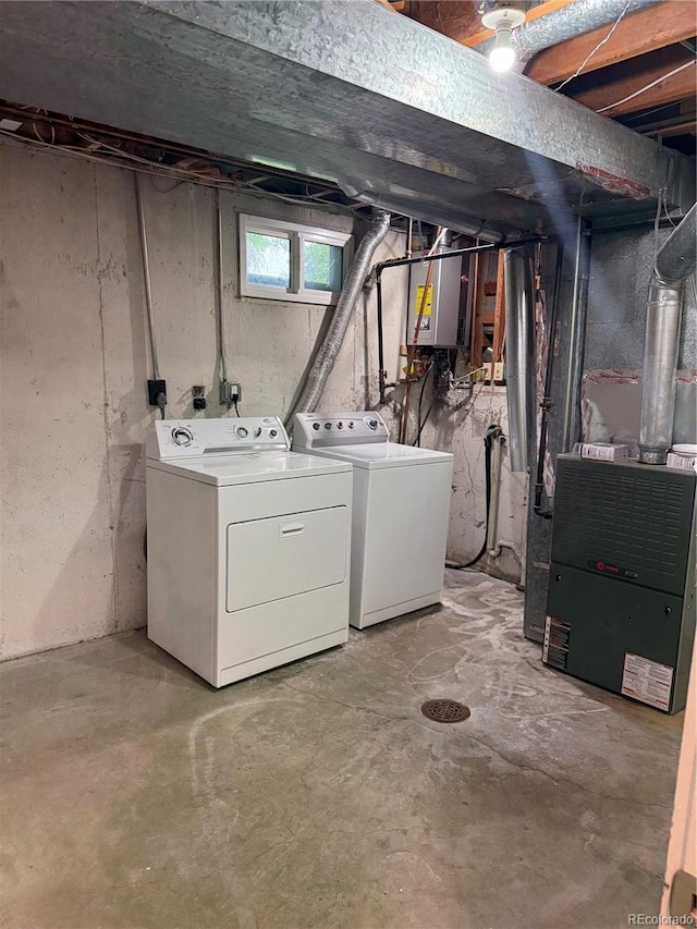 3566 E Fair Pl, Centennial, CO 80121 - basement with washing machine and dryer, water heater, and heating unit
