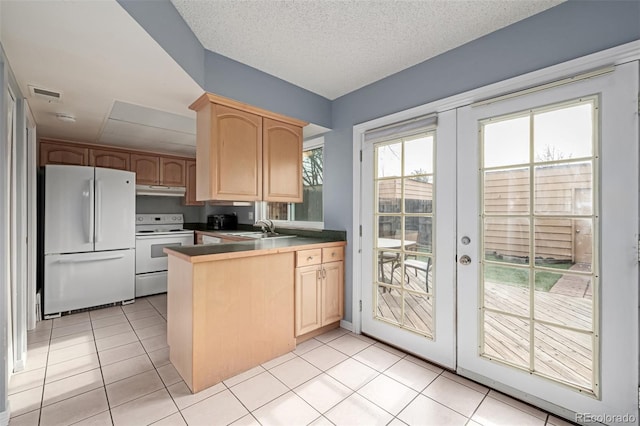 kitchen with french doors, light brown cabinetry, sink, light tile patterned floors, and white appliances