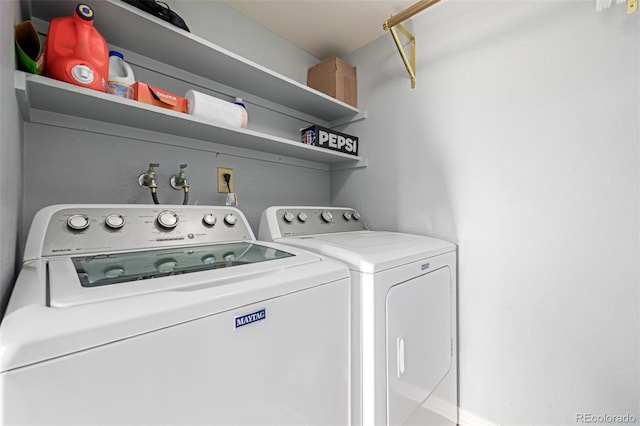 laundry room featuring separate washer and dryer