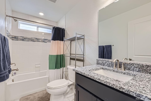 bathroom featuring vanity, toilet, and shower / tub combo with curtain