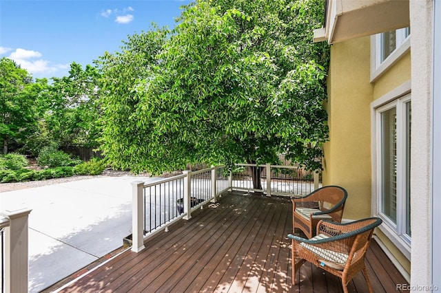 1564 S Uinta Way, Denver, CO 80231 - deck featuring a patio area