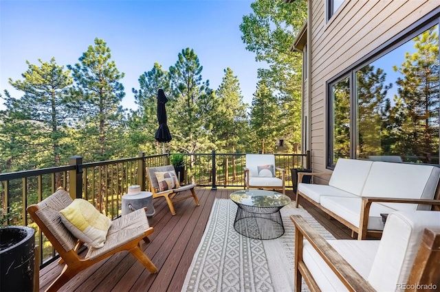 2873 Cortina Ln, Evergreen, CO 80439 - deck featuring an outdoor hangout area