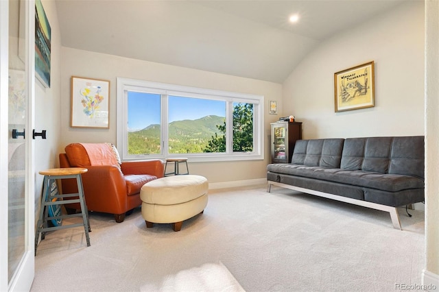 2873 Cortina Ln, Evergreen, CO 80439 - carpeted living room featuring lofted ceiling and baseboards