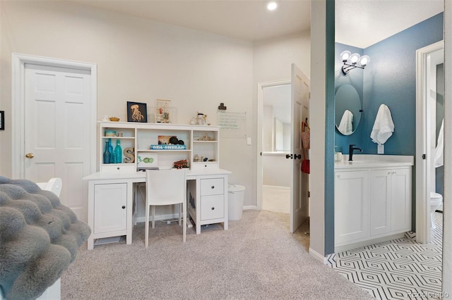 2873 Cortina Ln, Evergreen, CO 80439 - office area featuring light colored carpet and a sink