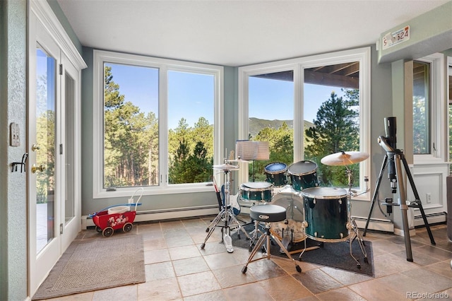 2873 Cortina Ln, Evergreen, CO 80439 - sunroom with baseboard heating