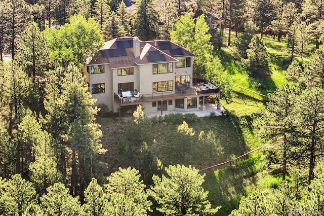 2873 Cortina Ln, Evergreen, CO 80439 - view of subject property featuring a heavily wooded area