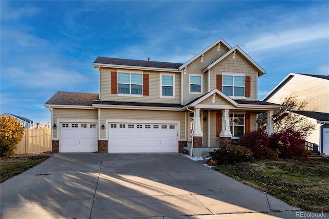 craftsman inspired home featuring a garage