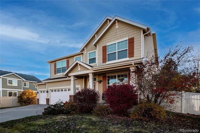 craftsman-style house with a garage and a porch