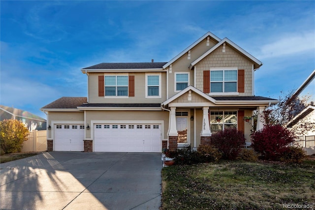 craftsman house featuring a garage