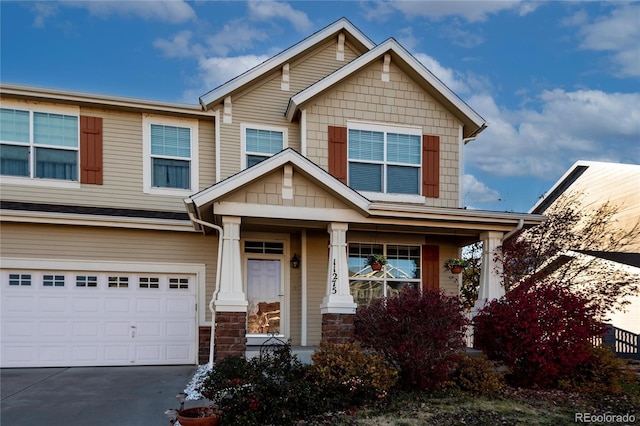 craftsman inspired home featuring a garage