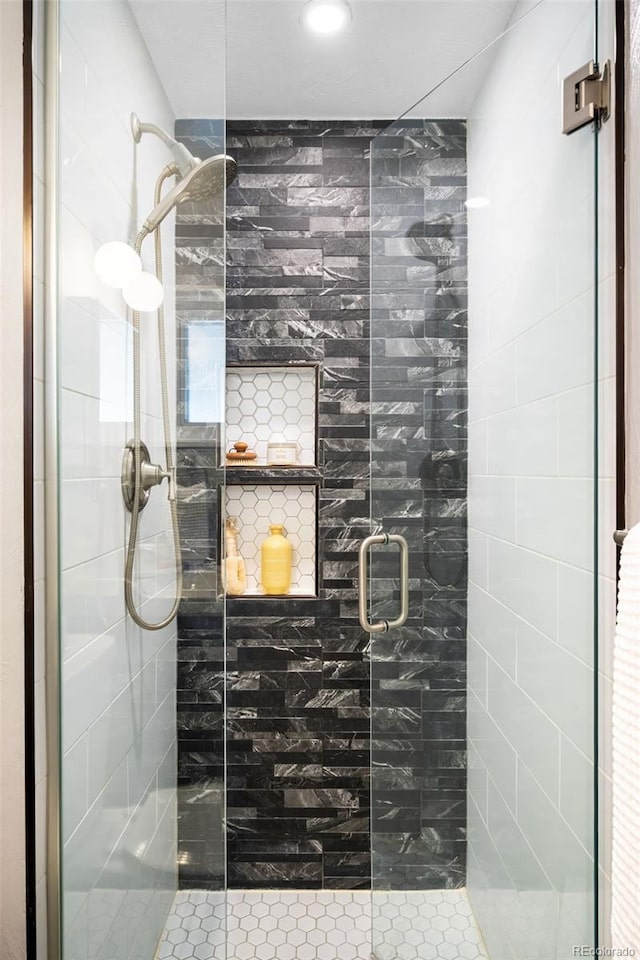 6015 Everett St, Arvada, CO 80004 - bathroom with a shower stall and recessed lighting
