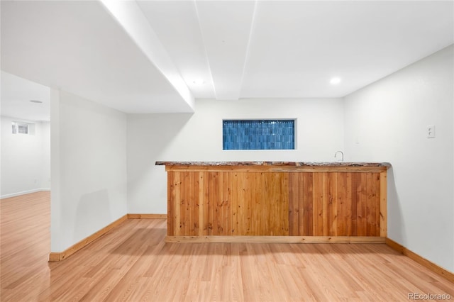 6015 Everett St, Arvada, CO 80004 - indoor wet bar with light wood-style flooring and recessed lighting