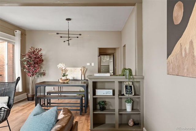 3725 Federal Blvd, Denver, CO 80211 - dining space featuring a chandelier and wood finished floors