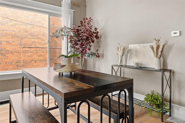 3725 Federal Blvd, Denver, CO 80211 - dining room featuring wood finished floors and baseboards